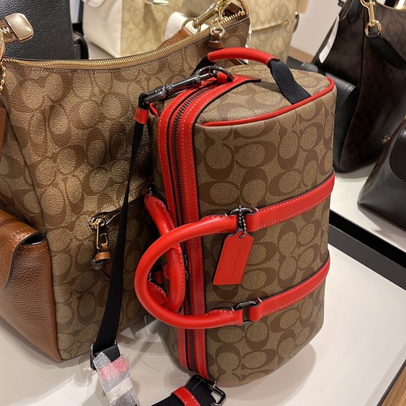 Coach men's Venturer Crossbody 27 In Colorblock Signature Canvas
QB/Khaki/Miami - Picture 10 of 16